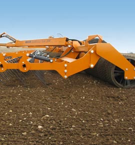 Photo of the Brock 2040 Double Lock Roller working a stony field